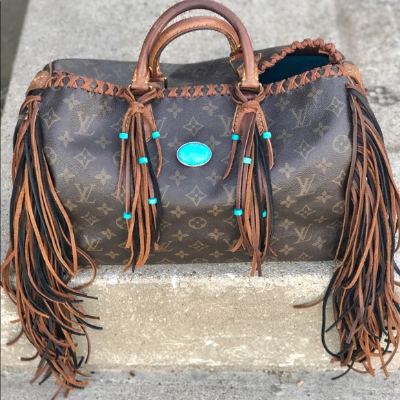 louis vuitton fringe backpack